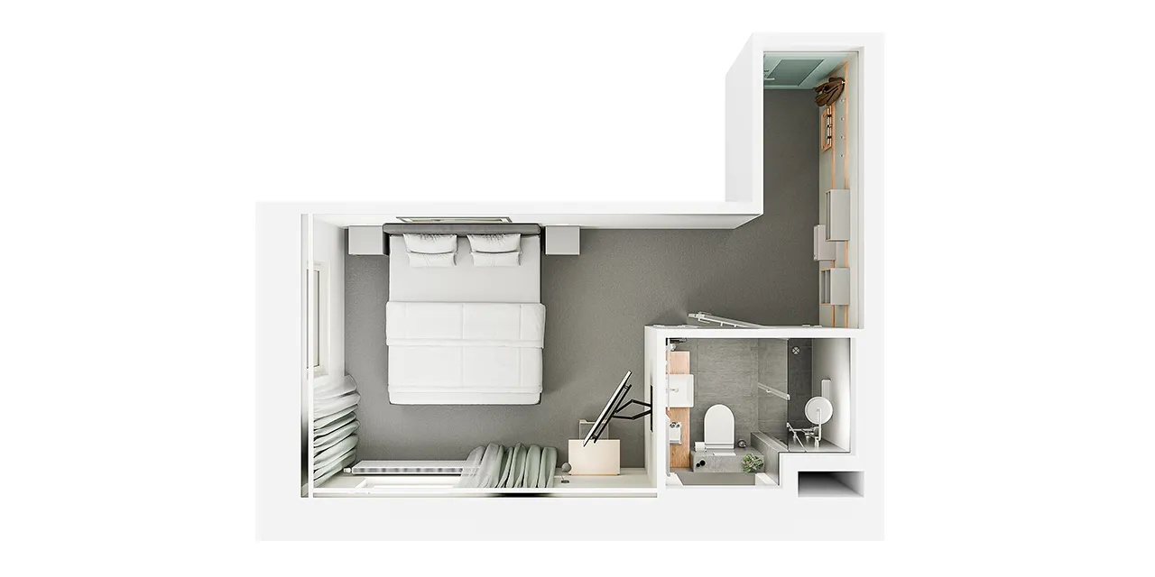 Ein Bett, das im Budgetzimmer des baltica Hamburg Altona steht.